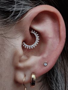 Daith piercing performed by Jane at Eternal Gold in Glasgow with a 14kt yellow gold ring
