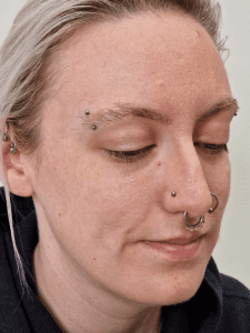 Eyebrow piercing performed by Jane at Eternal Gold in Glasgow with an implant grade titanium curved barbell